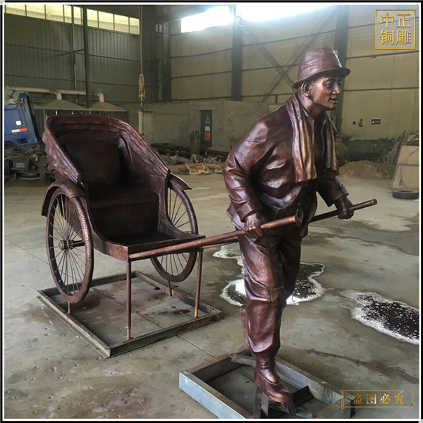 2拉车人物景观雕塑.jpg